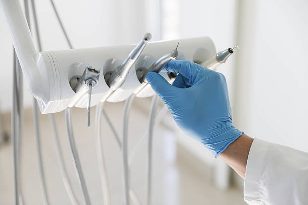 Professional Tooth Extraction technician working in Vandercook Lake, MI